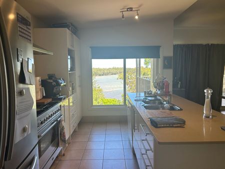 Spacious home surrounded by a leafy oasis with water views - Photo 2