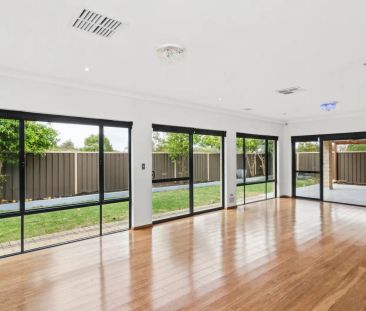 Spacious Family Living with Multiple Living Areas - Photo 6