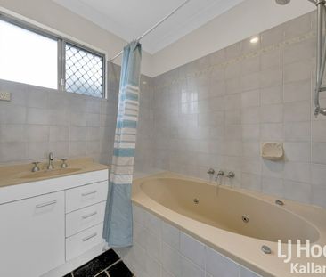 Practical 3 Bedroom Home With Yard and Storage - Photo 1