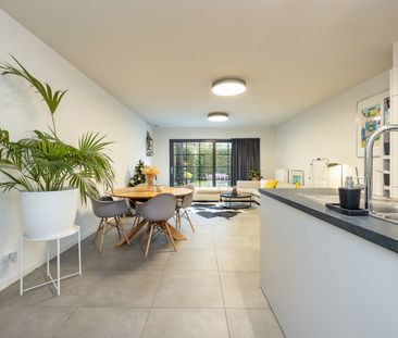 GELIJKVLOERS APPARTEMENT MET TUIN OP RUSTIGE LOCATIE - Photo 1