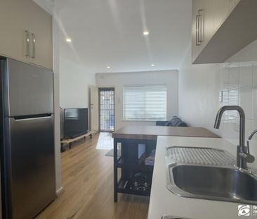 Renovated 2 Bedroom Unit with Rare Double Undercover Parking - Photo 5