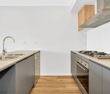 Looking to live near Wyndham Vale Square Shopping Centre? This home... - Photo 5