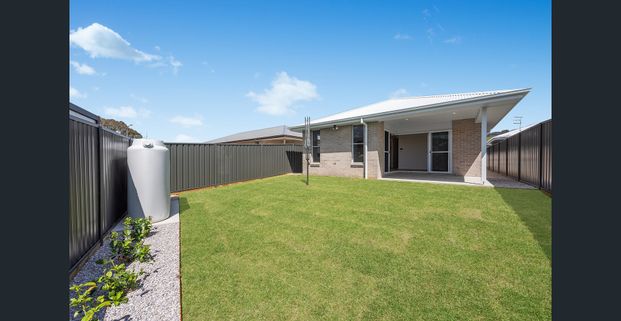 Contemporary 4 Bedroom Home in Logan Estate - Photo 1