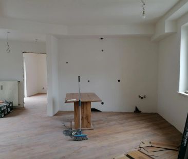 Gemütliche 3-Zimmer-Erdgeschosswohnung mit kleinem Grund - Foto 1