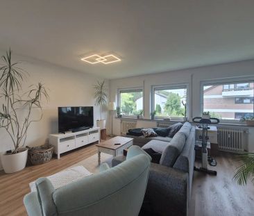 Helle 3,5-Zimmer-Wohnung mit großem Balkon, Gartenanteil und Garage... - Foto 1
