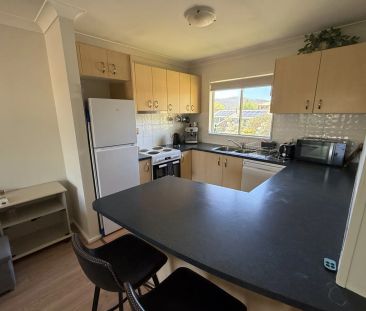 Conveniently Located 2-Bedroom Unit with Garage - Photo 4