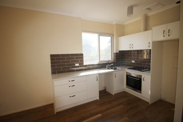 Open the Door to Trendy, Low-Maintenance Living in South Plympton - Photo 1