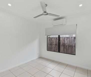 Low maintenance living with private tropical pool. - Photo 2