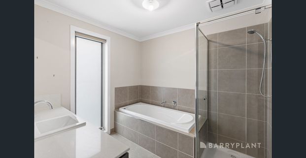 Stylish Four-Bedroom Retreat with Alfresco and Multiple Living Zones - Photo 1