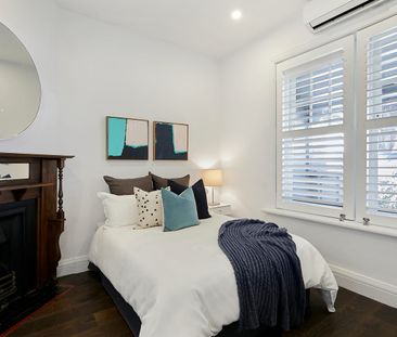 Bright & Renovated Edwardian with Off-Street Parking - Photo 3