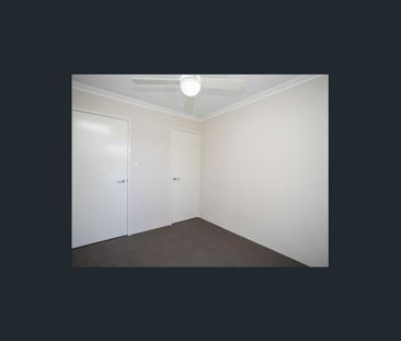 Coastal Comfort: Your Family Home Steps Away from the Beach! - Photo 4