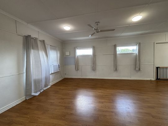 Upstairs Unit - Convenient Location with Electricity and Water included!! - Photo 1