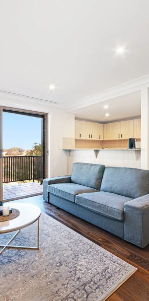 Beautifully Renovated Townhouse-Style Apartment in Resort-Style Complex - Photo 1