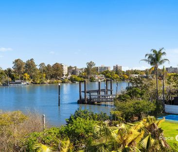 Elegant Riverfront Living Just Minutes From The City - Photo 1