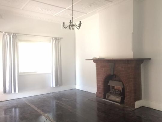 1920's Charisma with Lawn Maintenance Included! - Photo 1