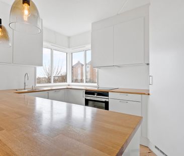 Nyrenoveret lejlighed med åben og lukket altan - Photo 5