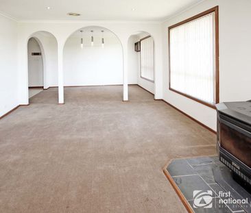 Sitting Amongst the Flowers - Photo 2