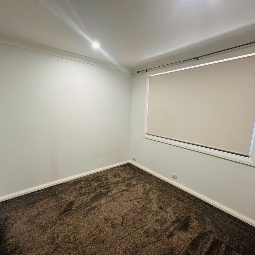 Spacious & Modern Family Home Close to Amenities - Photo 1