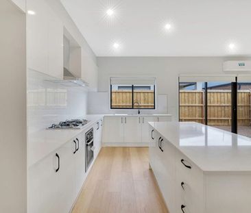 Beautifully Designed 4-Bedroom Family Home in Prime Location - Photo 2