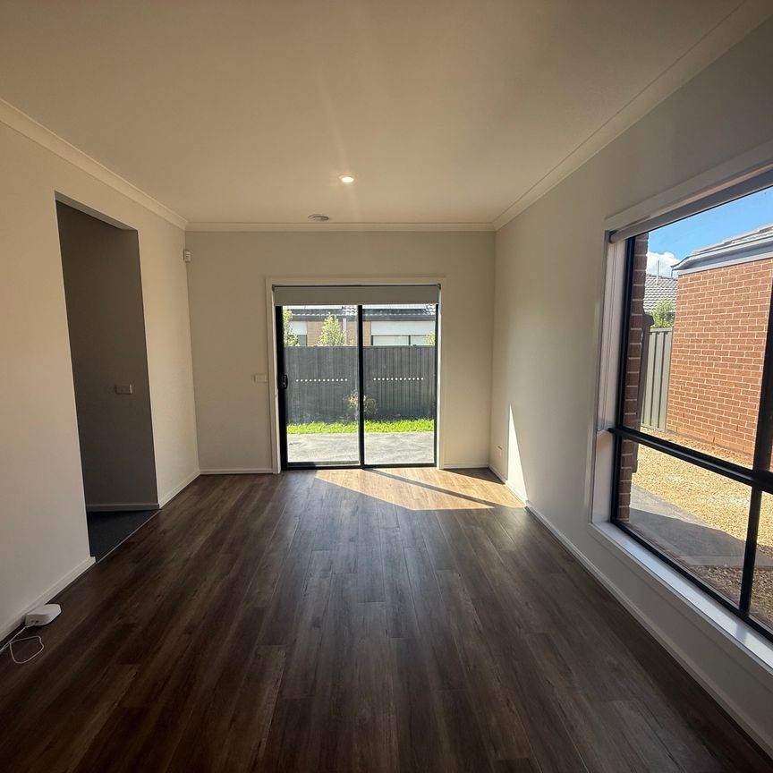 Modern Four-Bedroom Home with Contemporary Brick Features & Double Garage - Photo 1