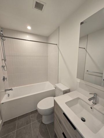 Modern 2 Bedroom Condo - Photo 4
