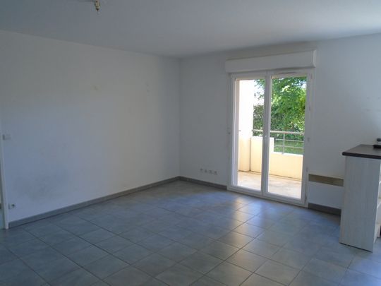 Location Appartement 2 pièces 45m² LANNEMEZAN 65300 - Photo 1