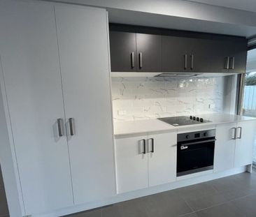 Stylish Modern Home with Ducted A/C & Water Included - Photo 5