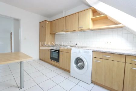 Schöne & großzügige Dachgeschosswohnung in Feldrandlage in Norderstedt - Photo 4