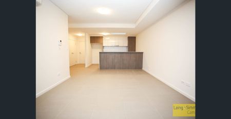 Top Floor Executive Apartment : Shopping Strip Location - Photo 4