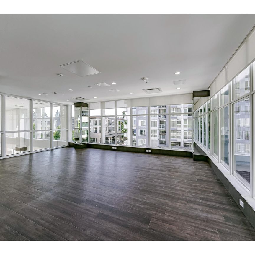 Stunning Corner Two Bedroom Home with View in Central Surrey Includes Parking and Storage - Photo 1