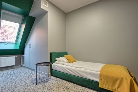 Mieszkanie 2-poziomowe na Starym Mieście - Photo 2