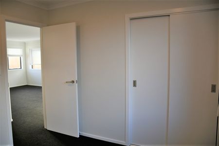 This near new attached two bedroom home offers a spacious open plan kitchen / dining and living. - Photo 4