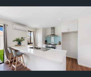 Stylish, Low-Maintenance Living in a Convenient Location - Photo 5
