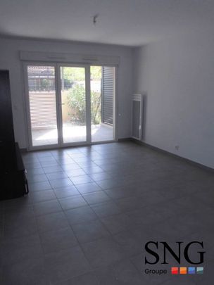 T3 AVEC TERRASSE, JARDIN ET PARKING - Photo 1