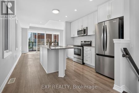 1440 Hemlock Modern 3 Storey End Unit Townhome (3 Bed, 2.5 Bath) - Photo 2