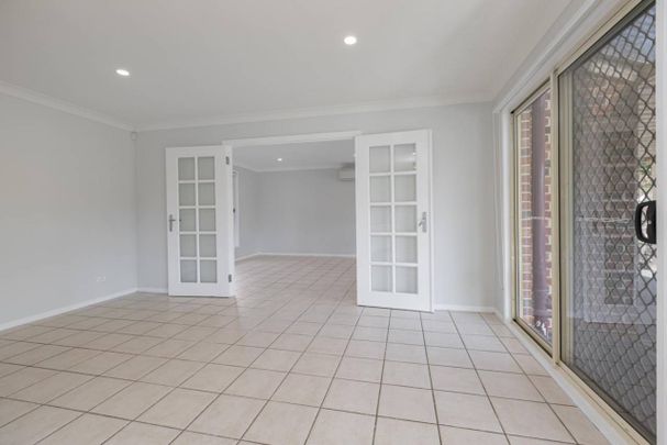 Spacious Family Home with Room for Everyone! Located on a generous corner block - Photo 1