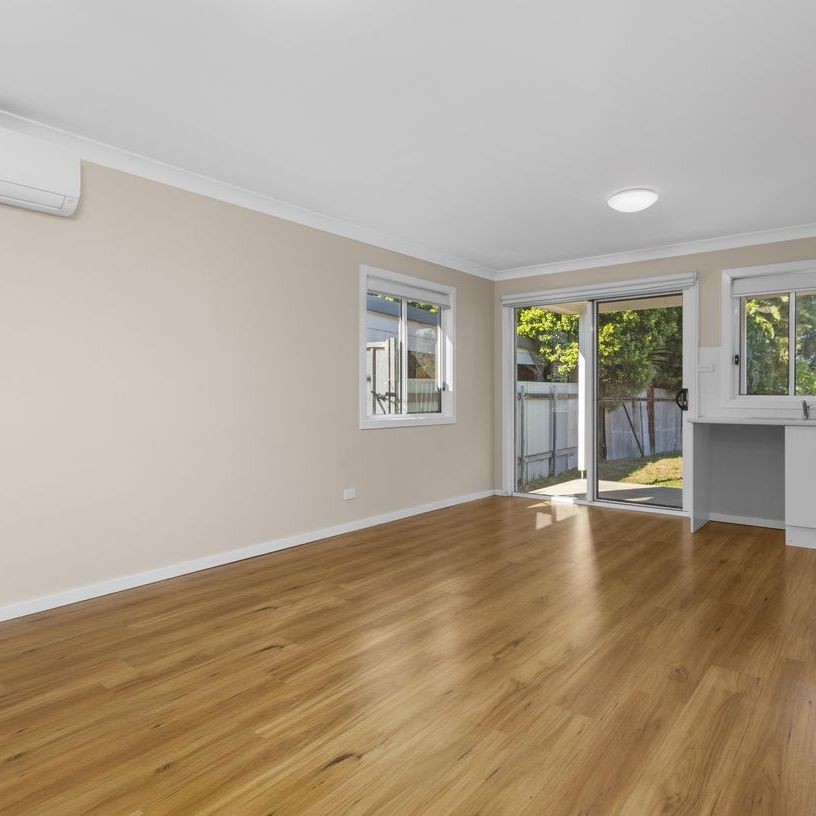 TIDY LIVING WITH LARGE YARD - Photo 1