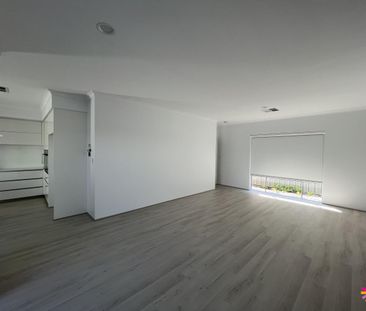 MODERN HOME IN UP AND COMING AREA! - Photo 1