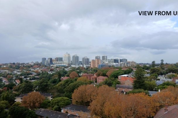 Light And Bright Two Bedroom Apartment with pool in Security Building - Photo 1