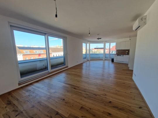 TOLLE LOFTARTIGE PÄRCHENWOHNUNG mit TERRASSE und BLICK zum RIESENRAD - Foto 1