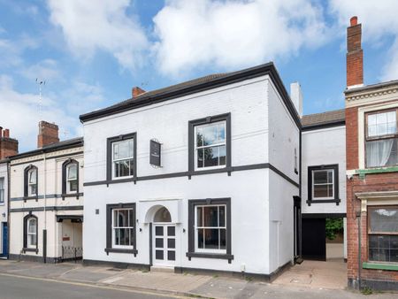 Step into stylish city living with this high-spec HMO in a stunningly repurposed pub—a perfect blend of character and modern comfort. Located in the heart of Derby City Centre (DE1), this beautifully converted property offers large studios and en-sui Room 5 - Photo 4