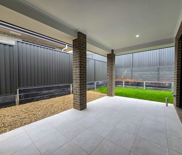 Spacious Family Living with Multiple Living Zones & Alfresco Entert... - Photo 6