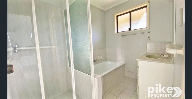 Neat as a pin - Central & Handy location! - Photo 1