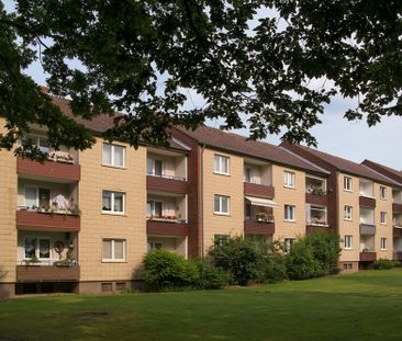 Helle Erdgeschoss-Wohnung mit Einbauküche - Foto 6