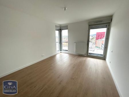 Location Appartement 3 pièces 69m² ST ETIENNE 42000 - Photo 3