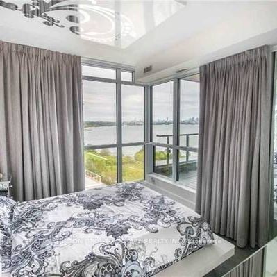 Feels brand new + den waterfront views parking included! - Photo 1