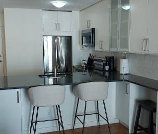 Fully Furnished 2 Bedroom Condo - All Utilities Included - Photo 1