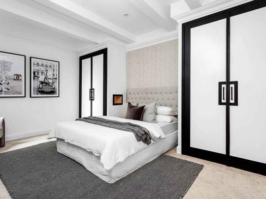 SEMI-STYLE APARTMENT IN QUIET BOUTIQUE SETTING - Photo 1