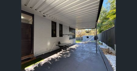 Freshly Updated 3-Bedroom Home with New Landscaping & Semi Furnished Comfort - Photo 5