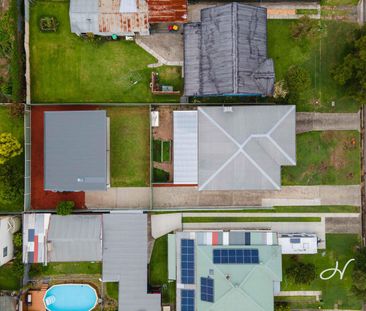 NEAR NEW, ARCHITECTURALLY DESIGNED HOME - Photo 5